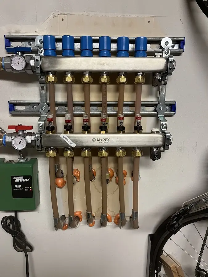 Plumber performing Gas Line Installation at a residential property in Parkville